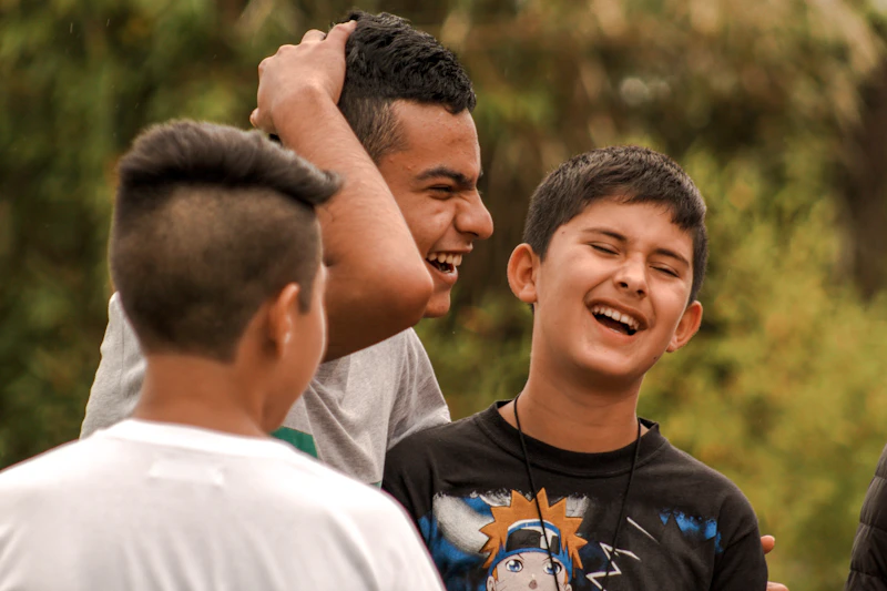 A group of men laughing together