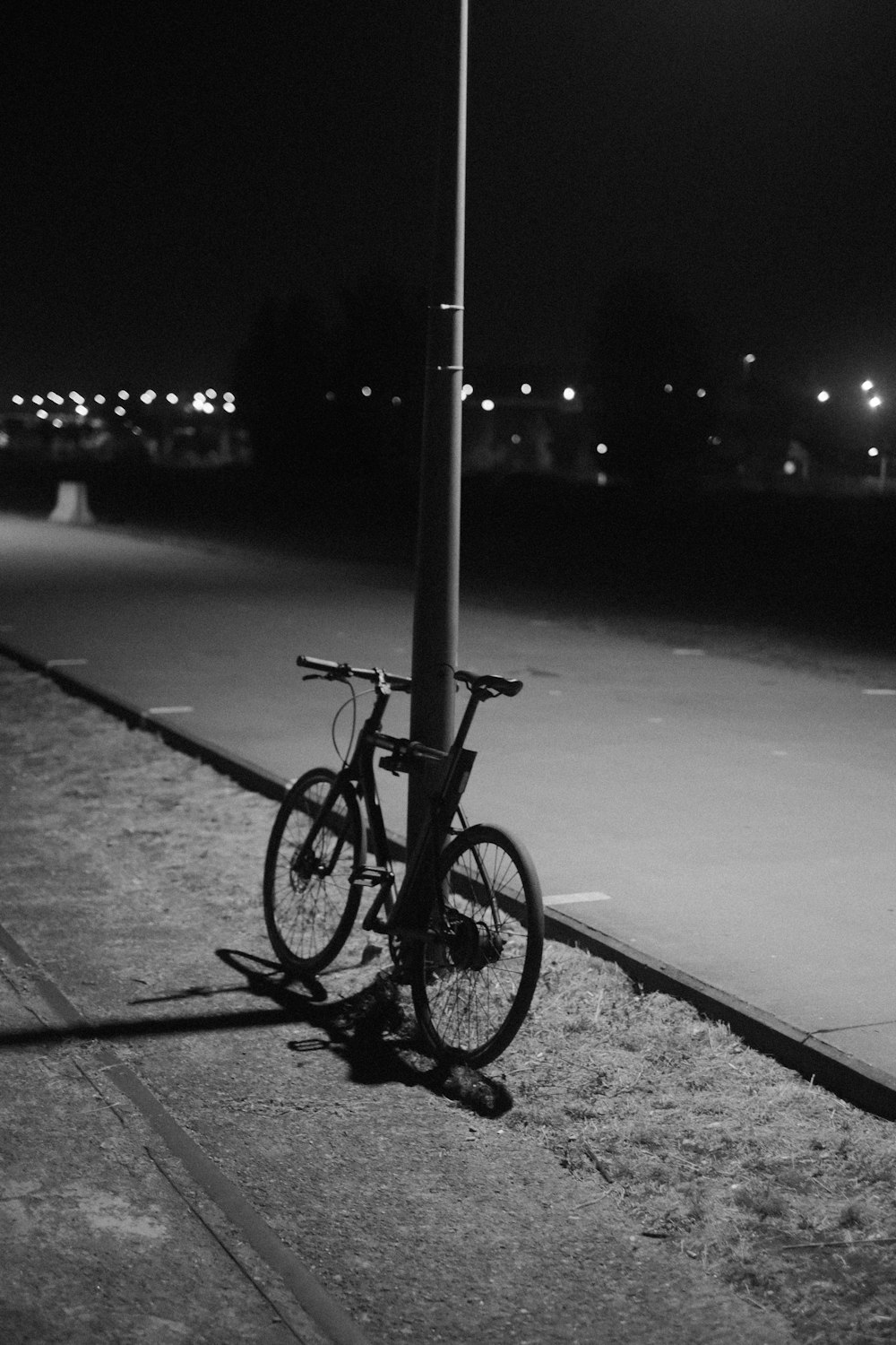 a bicycle parked on a street corner