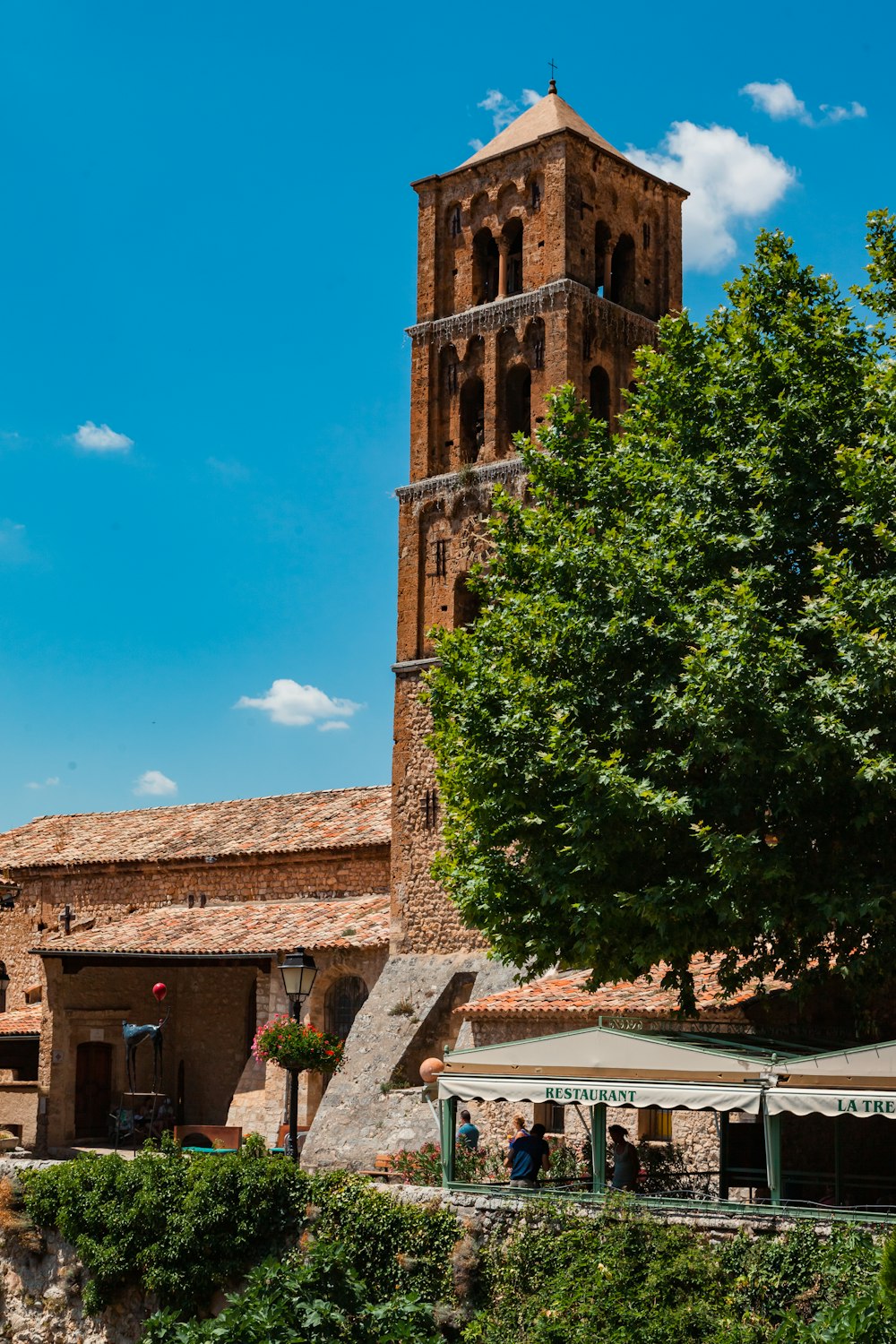 a tall brick building with a tower