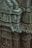 Close-up of intricate carvings on Mughal architectural elements showcasing craftsmanship.