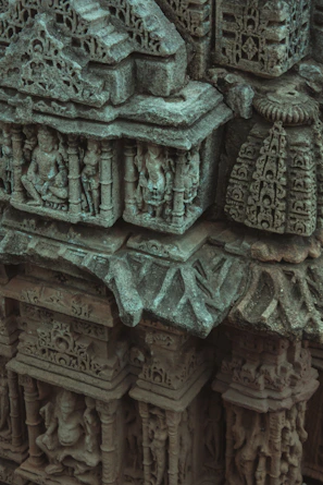 Close-up of intricate architectural details on an ancient temple wall.