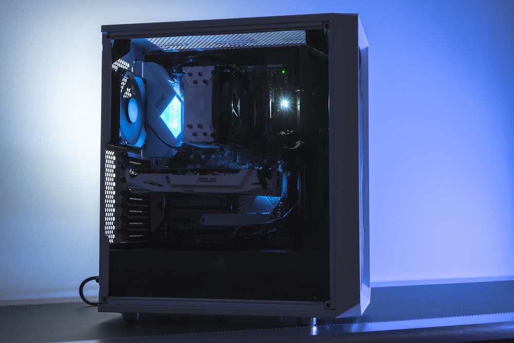 a computer with a blue light