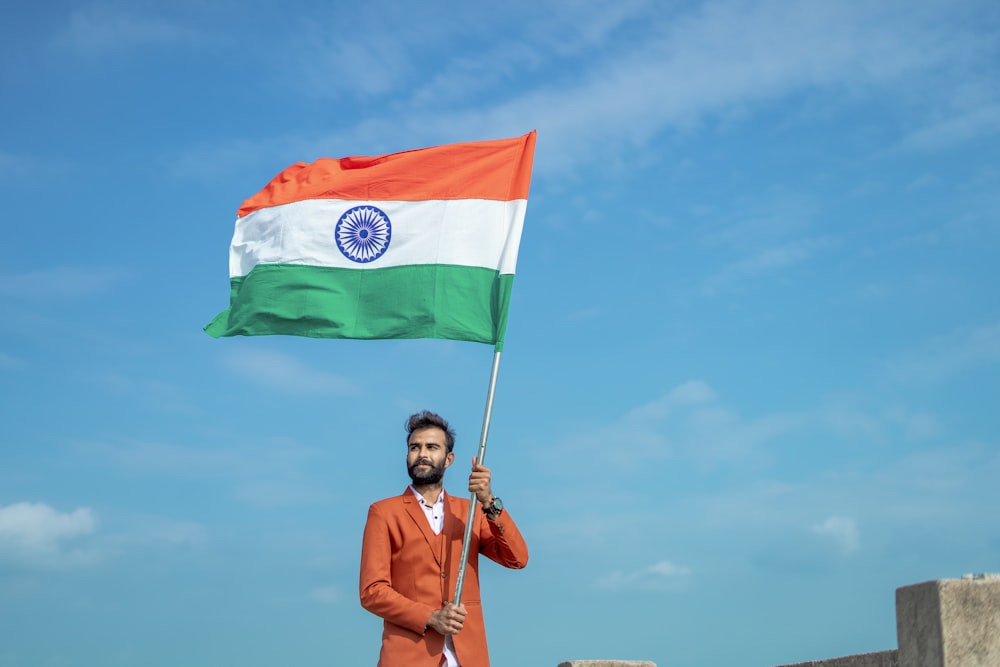 a man holding a flag