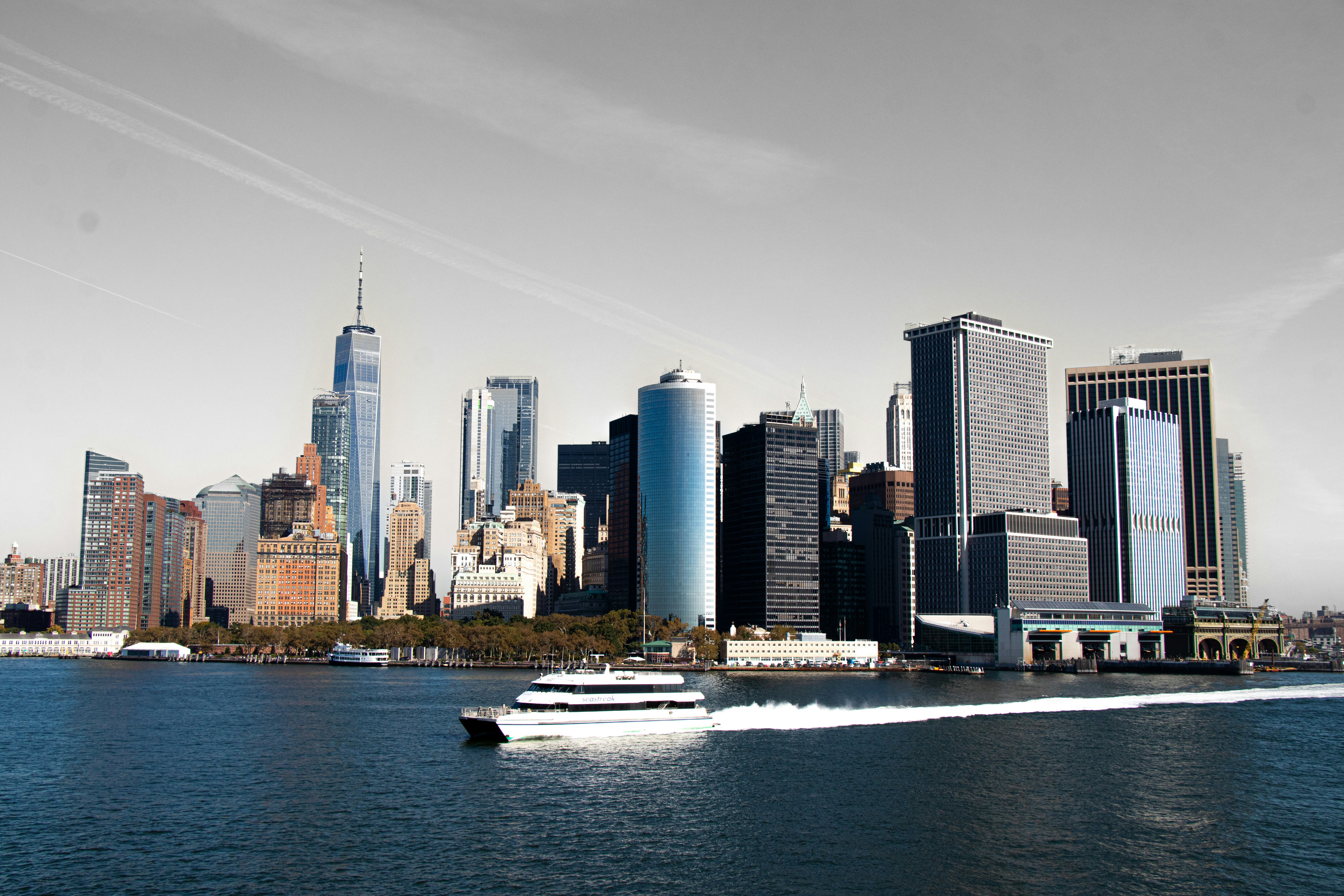 a city skyline with boats