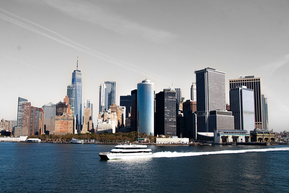 a city skyline with boats