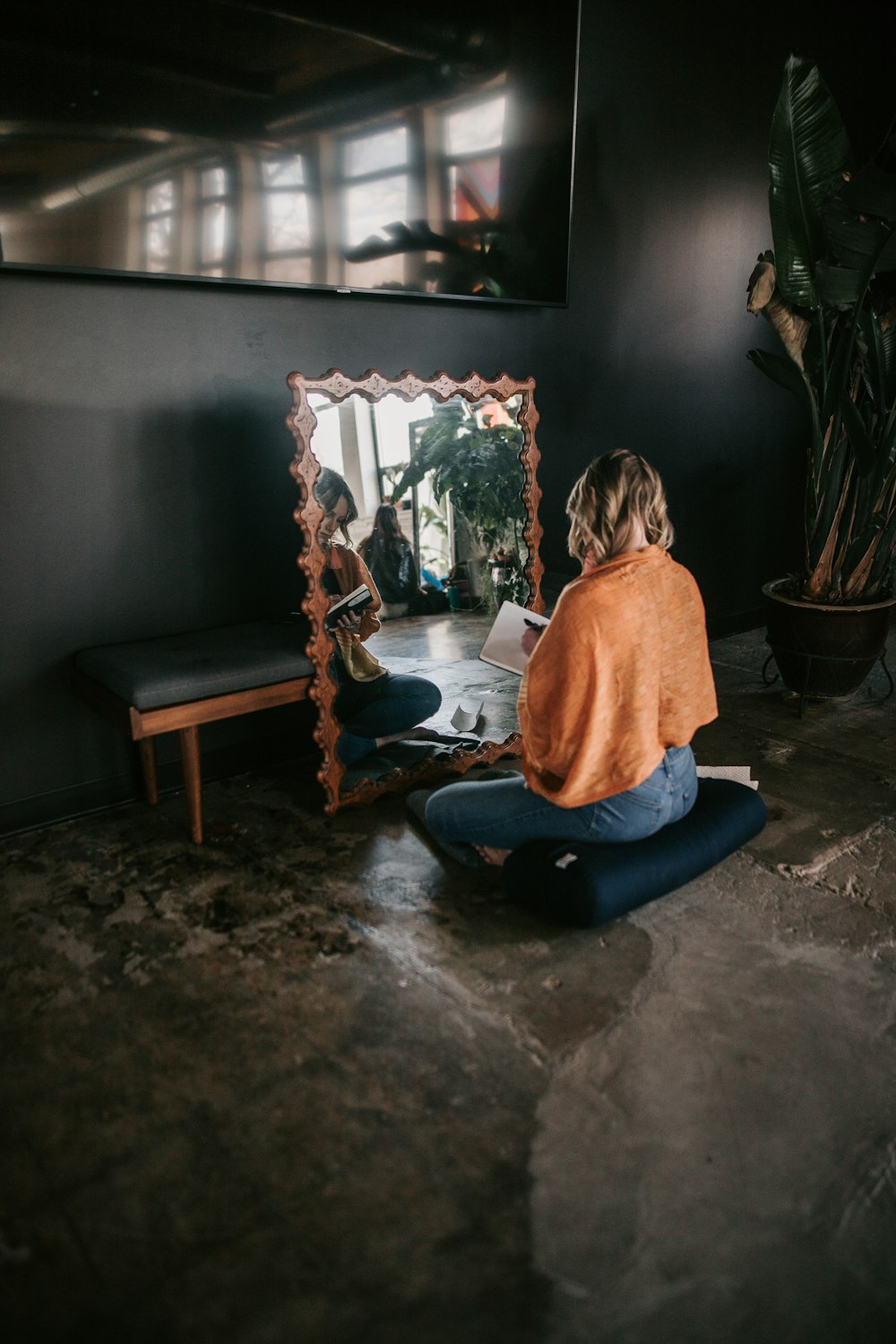 a person sitting on the floor