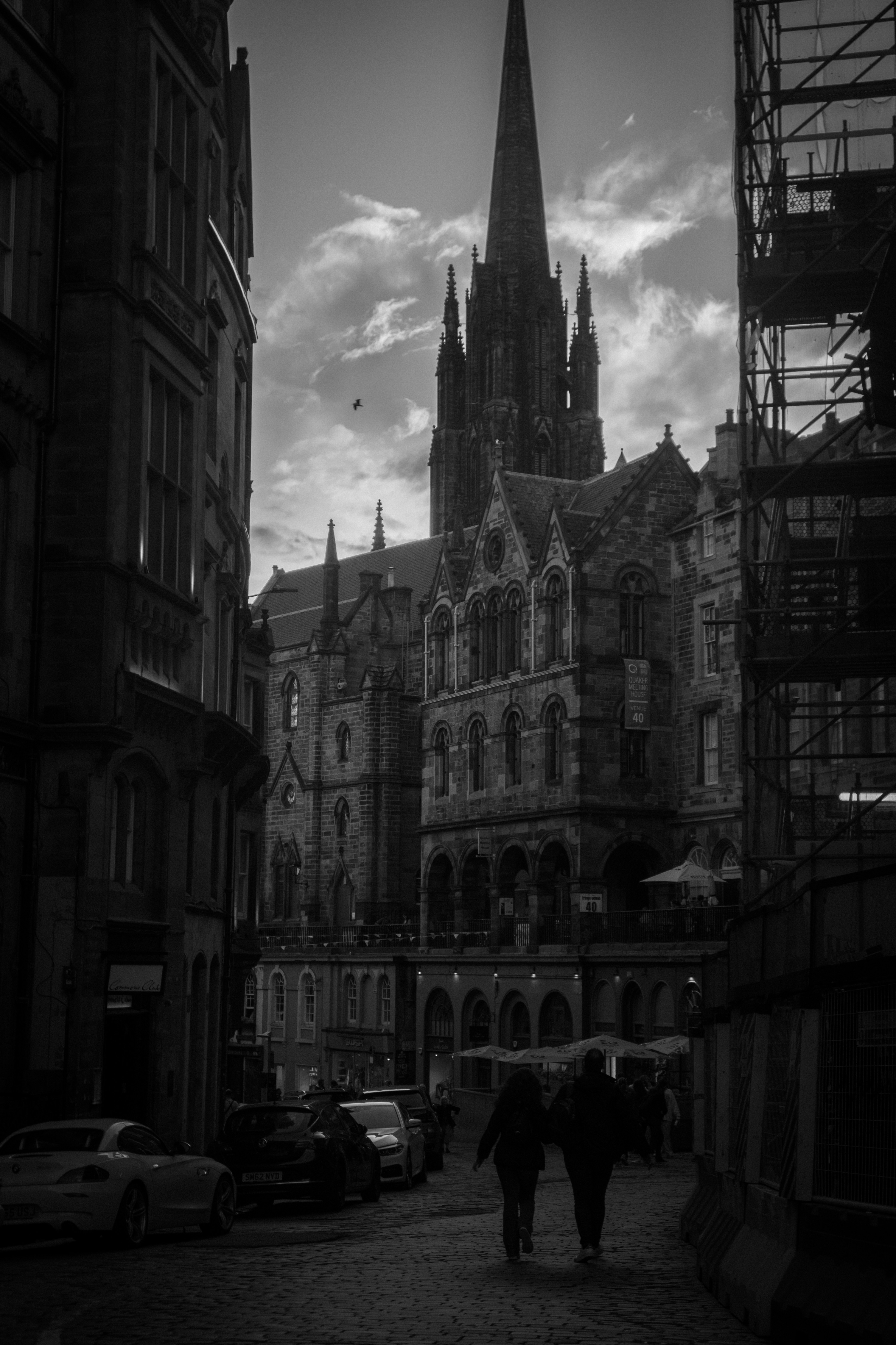 a street with cars and buildings on either side of it