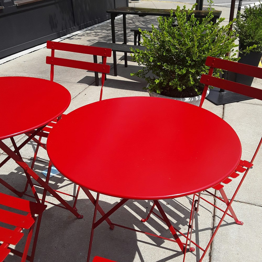 a group of red tables