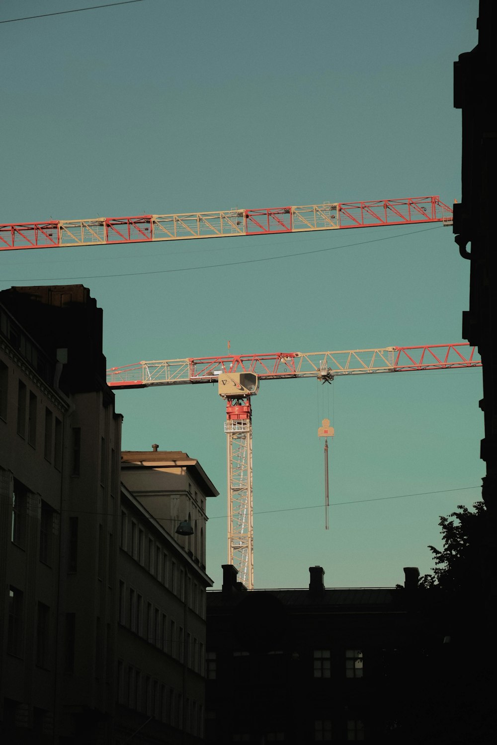 a large crane over buildings