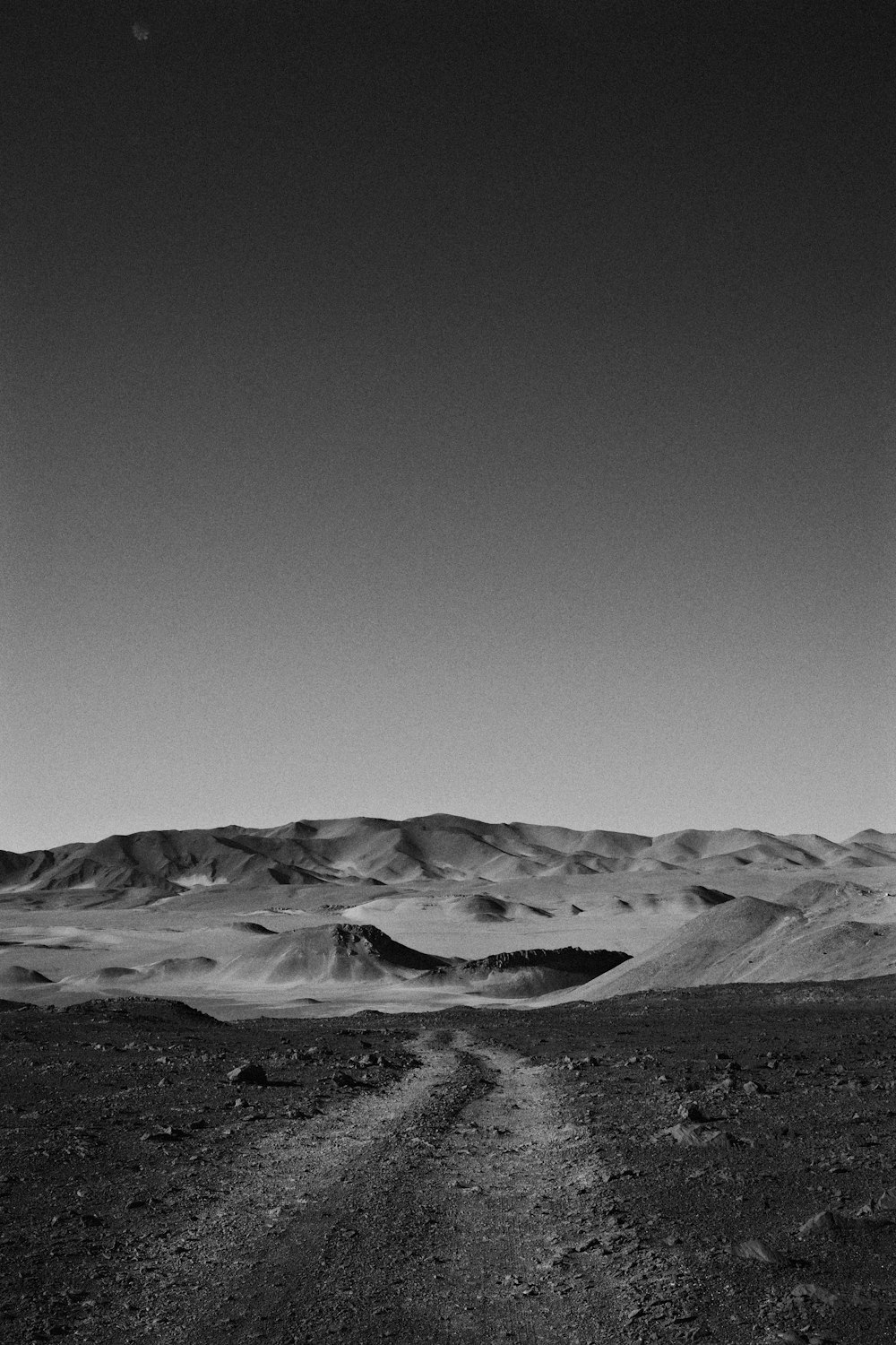 a desert landscape with hills