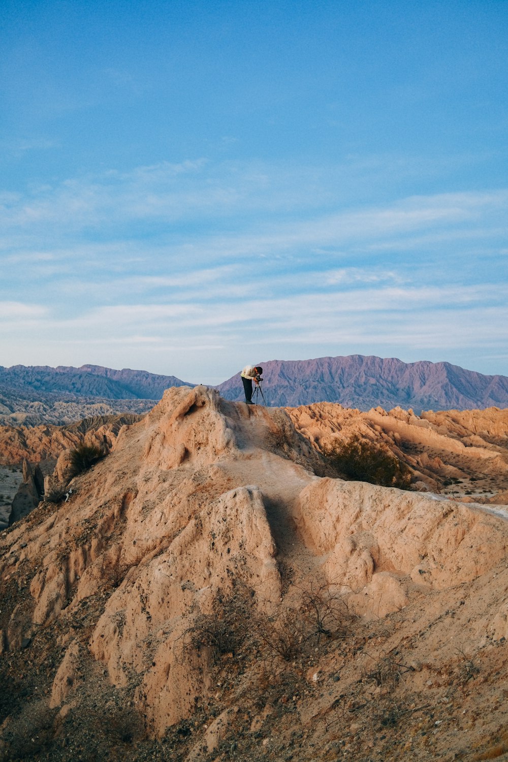 a person standing on a rock