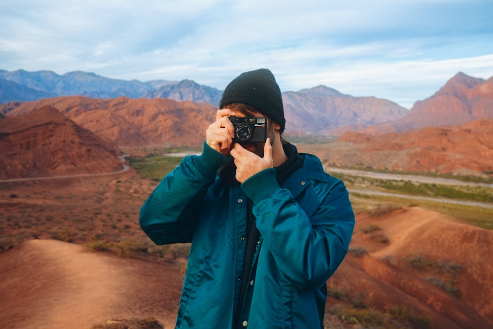 a man holding a camera