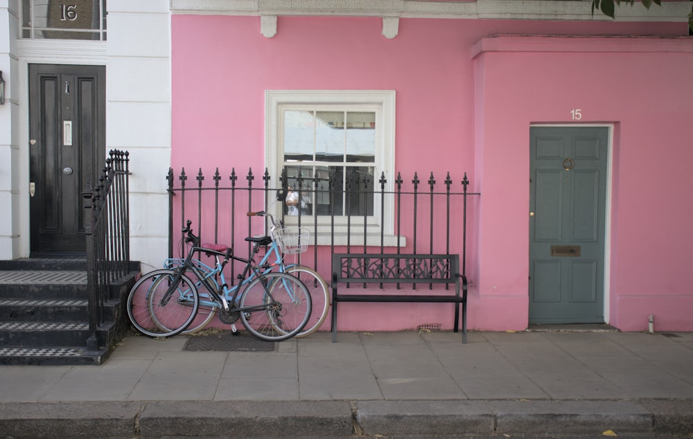 a bicycle parked on a sidewalk