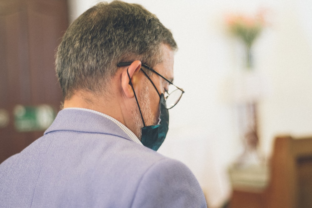 a man wearing glasses