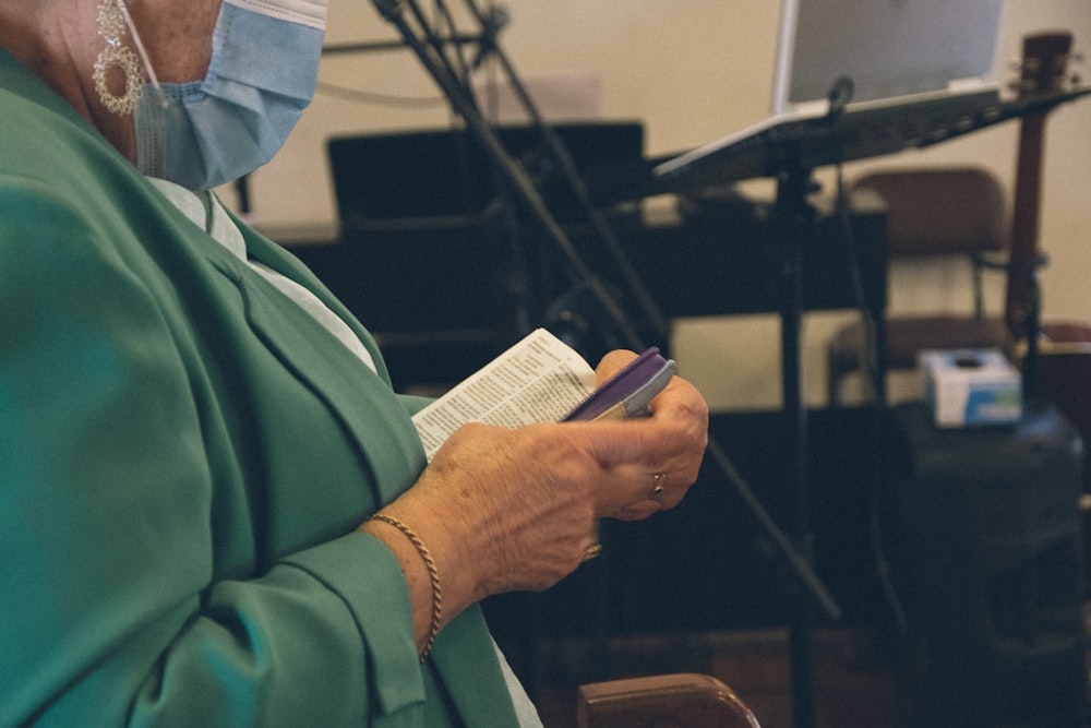 a person holding a pen