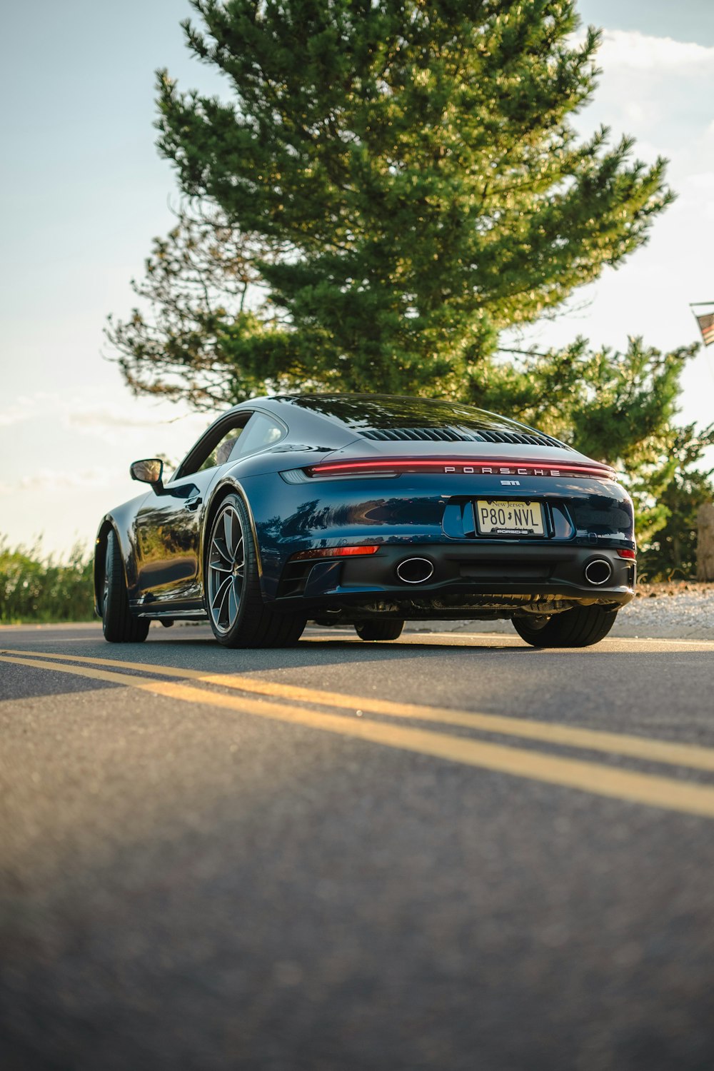 a sports car driving down the road