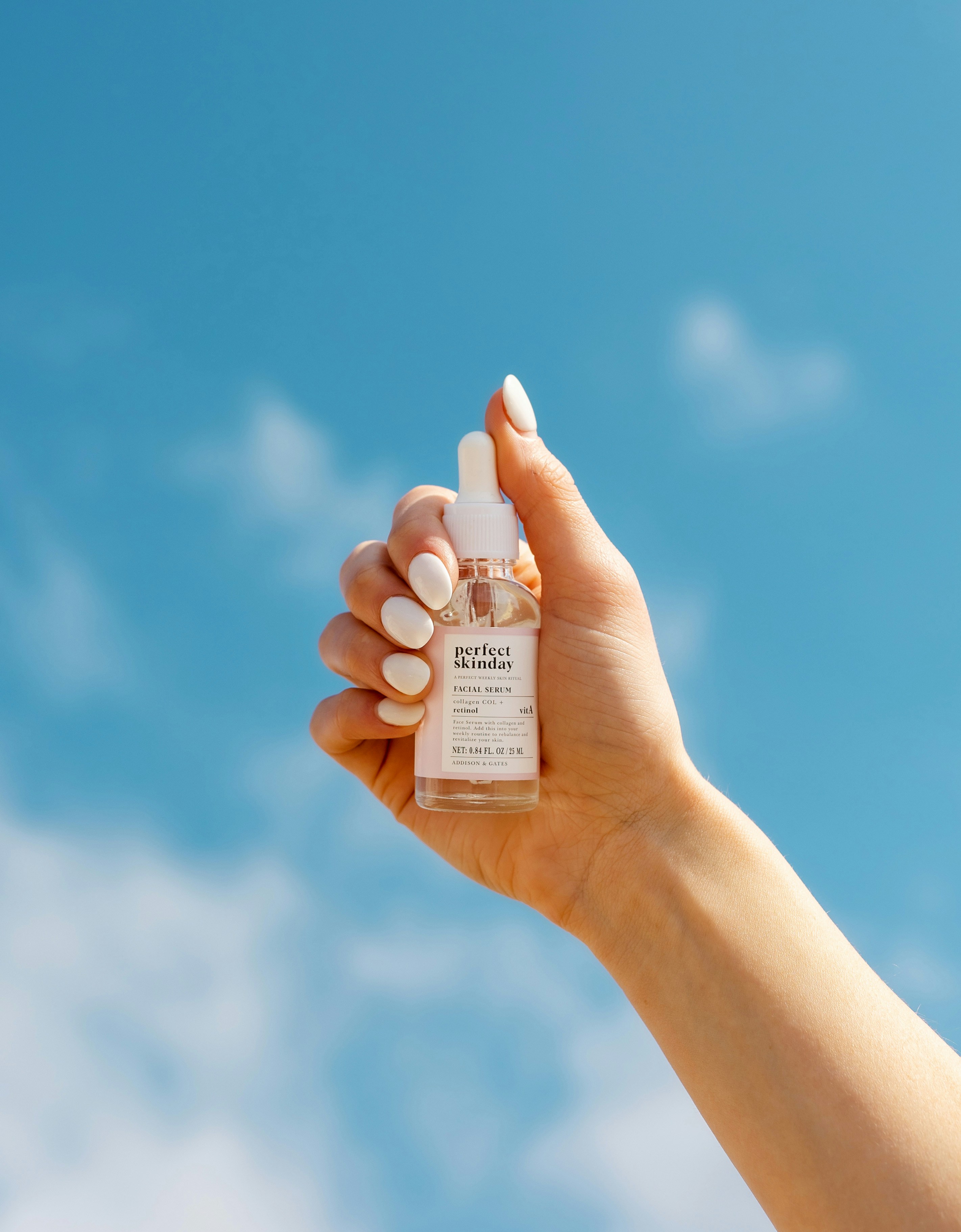 a person holding a bottle