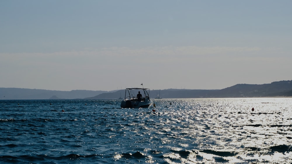 a boat sailing on the water