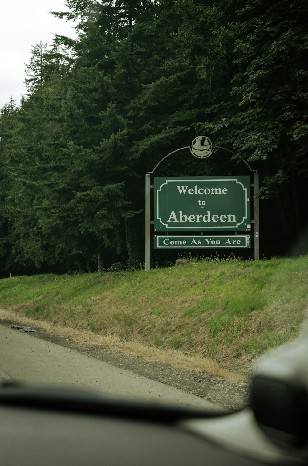 a sign on the side of a road