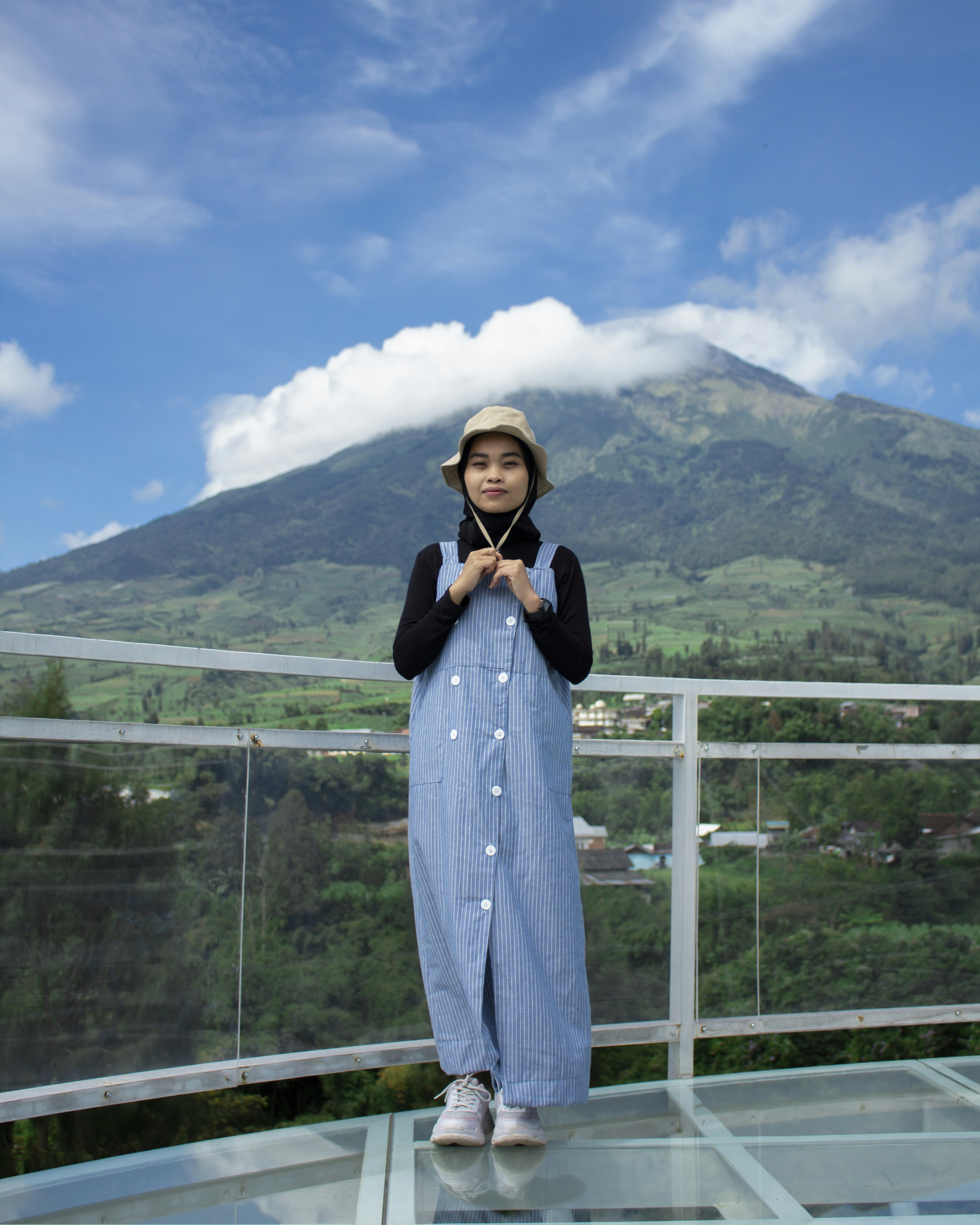 a person standing on a balcony