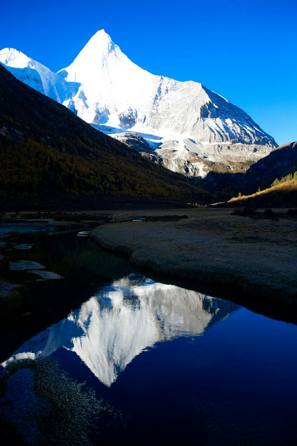 a mountain with snow on it