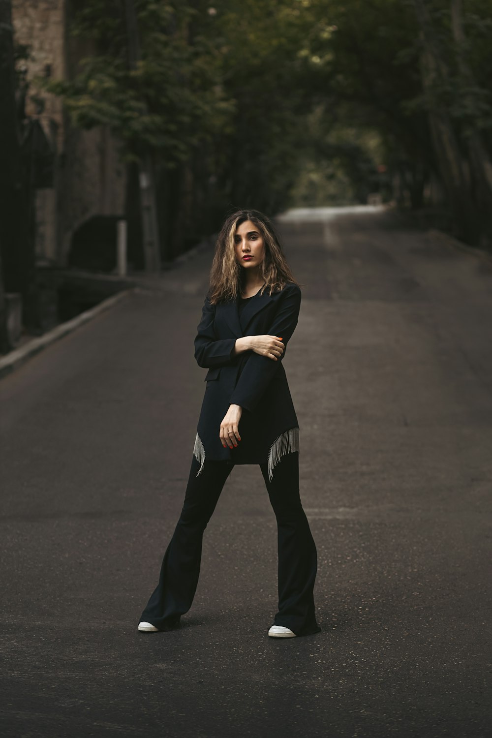 a woman walking on a road