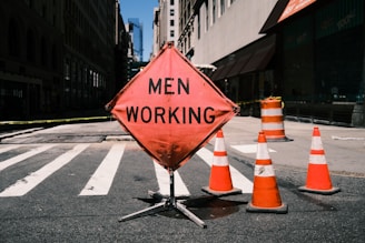 a road sign is posted on the side of a road