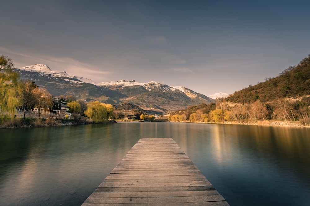 a wooden dock over a lake