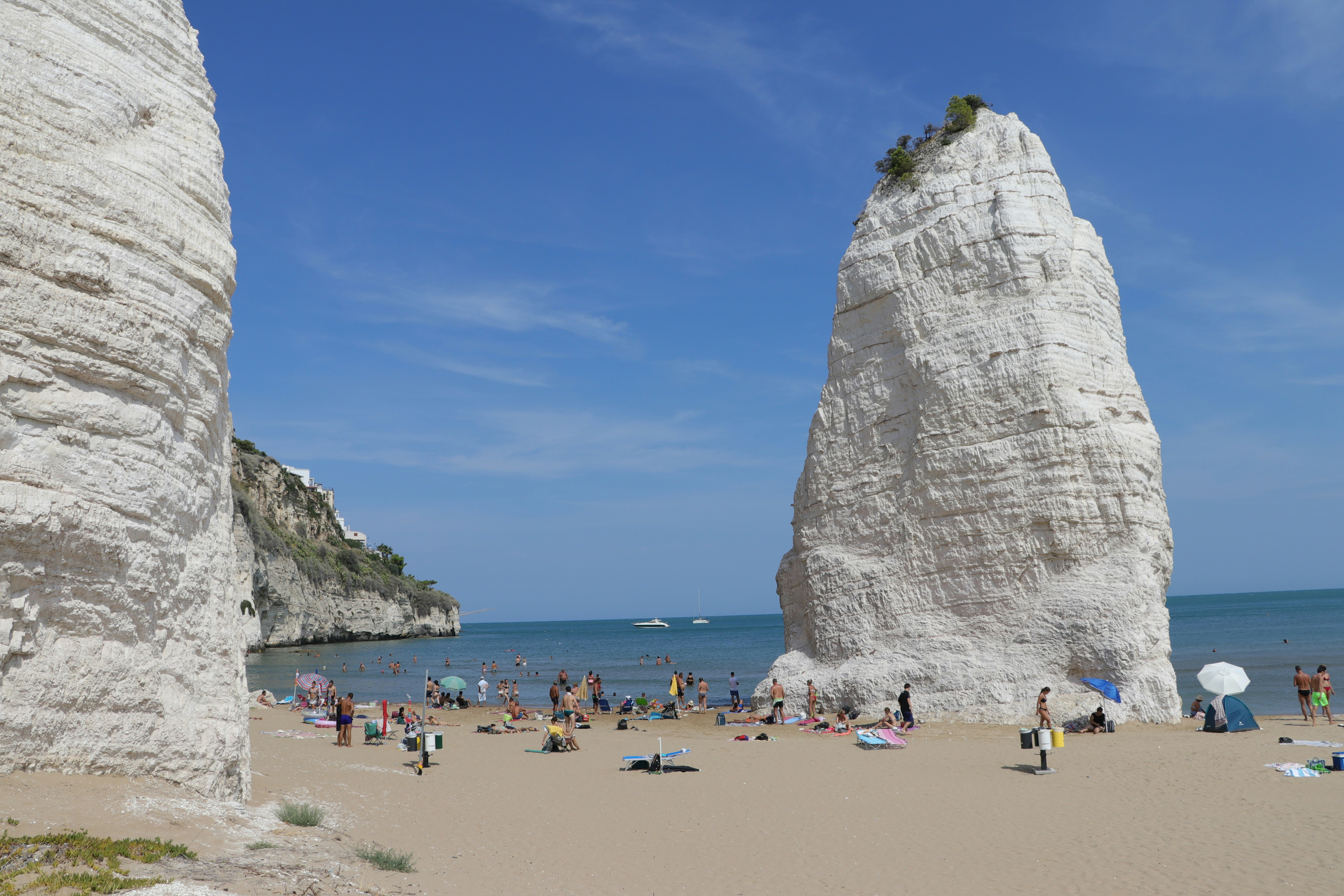 a large rock formation on a beach