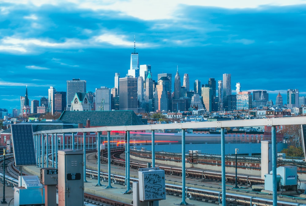 a city skyline with a bridge