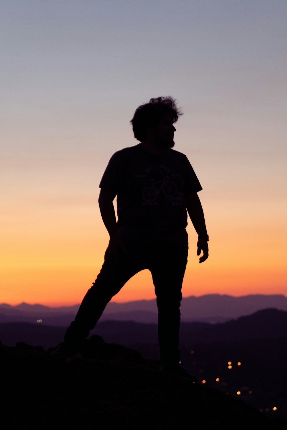 a man standing on a hill