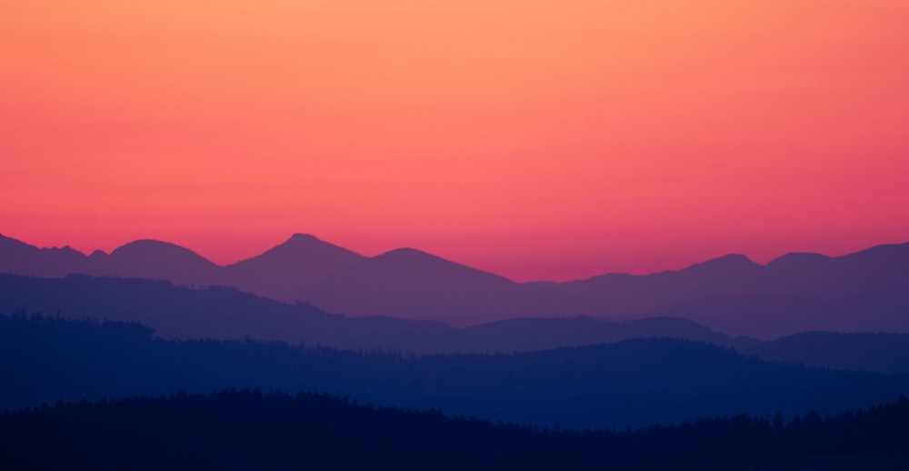 a landscape with hills in the back