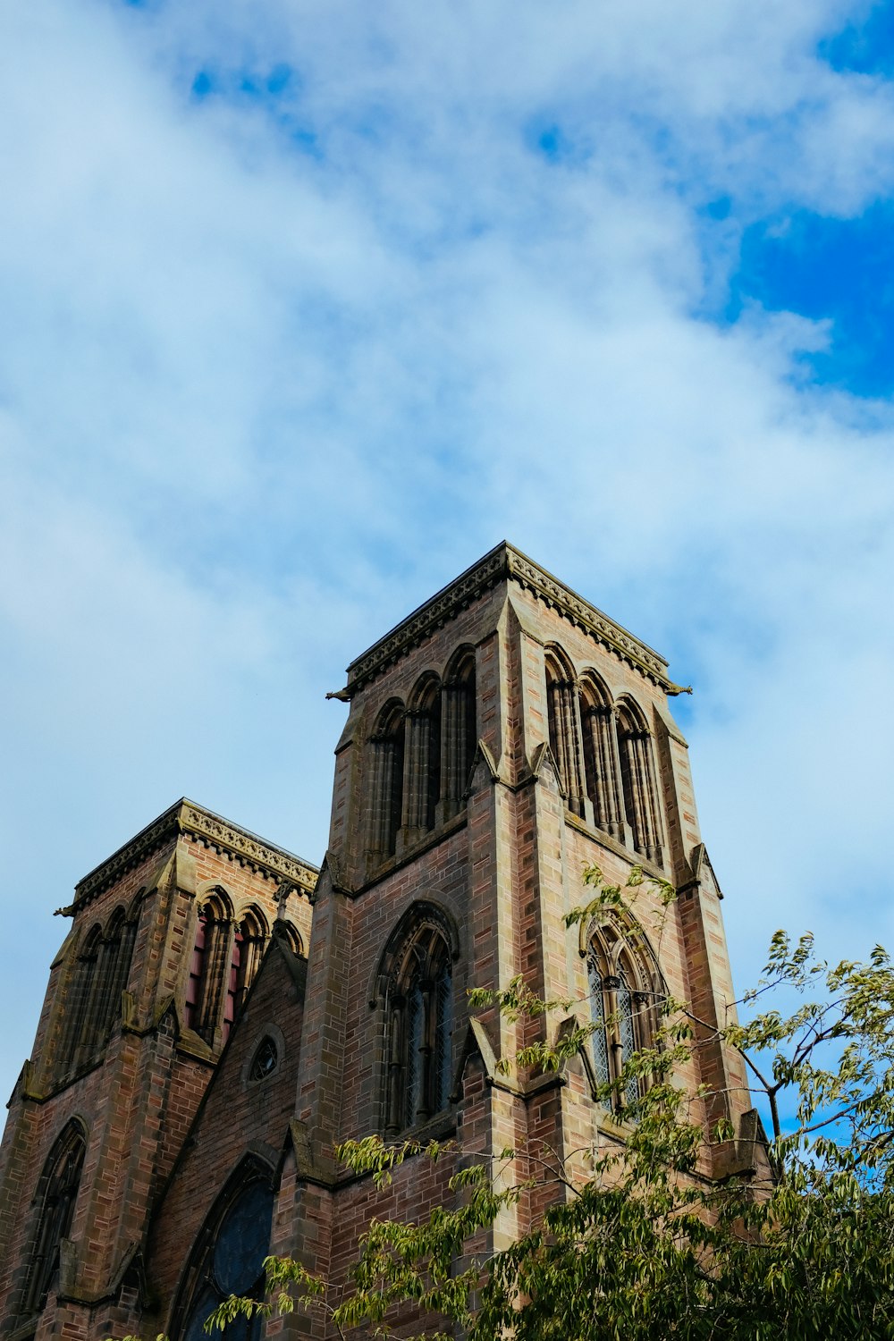 a tall brick building with a tower