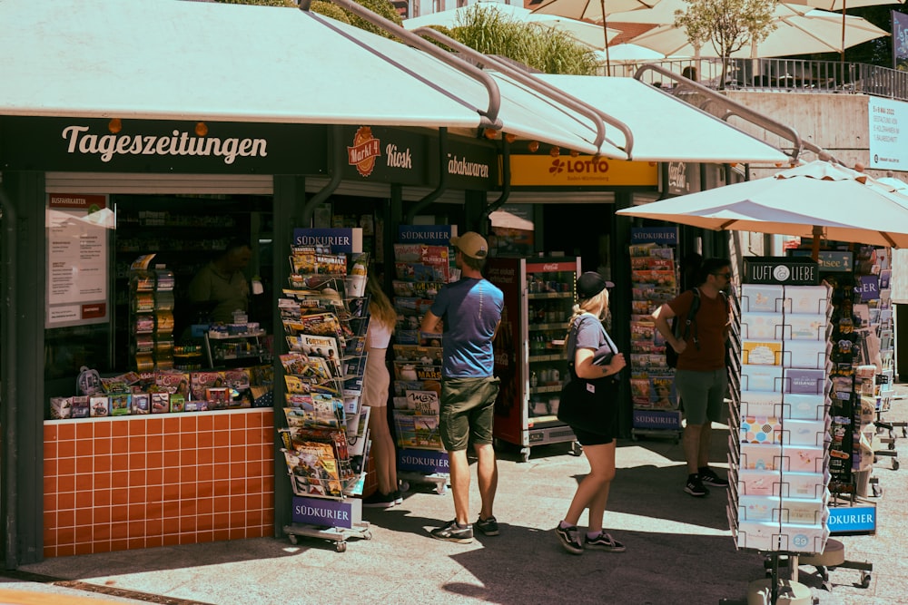 people standing outside a store