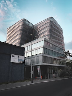 Commercial office space with glass facade and signage area.