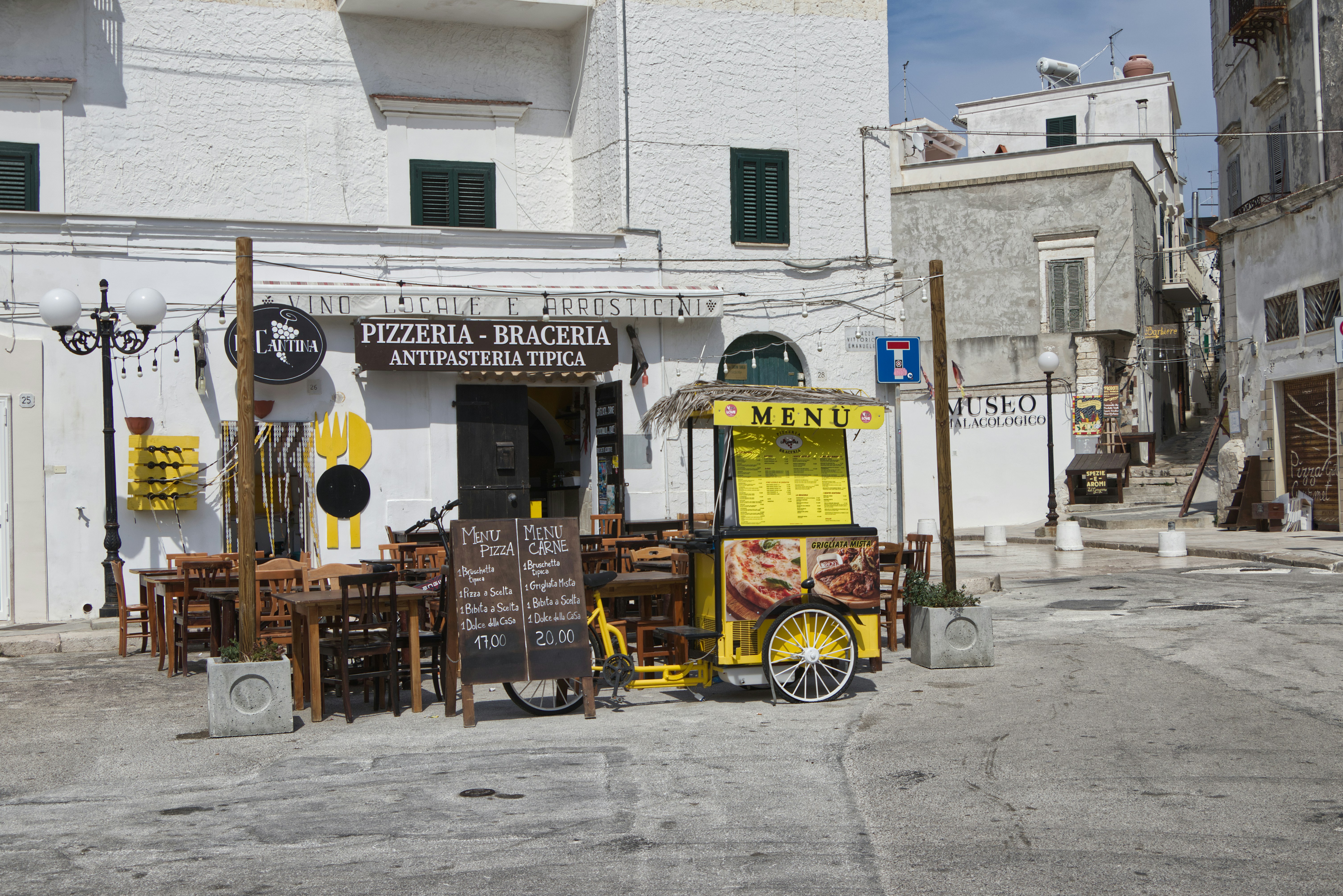 a small cart with a sign on it