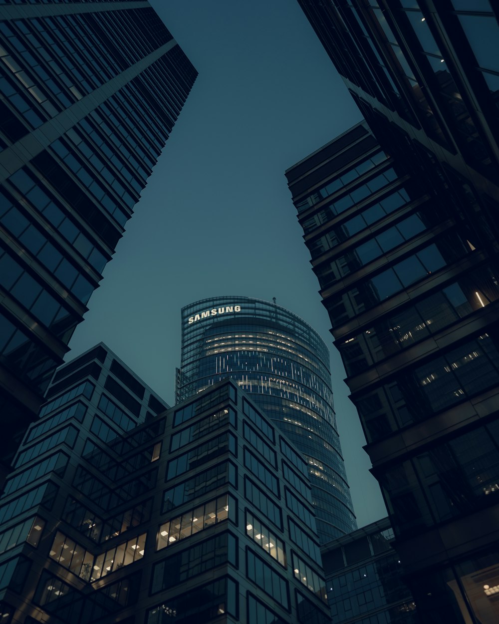 a group of skyscrapers with lights