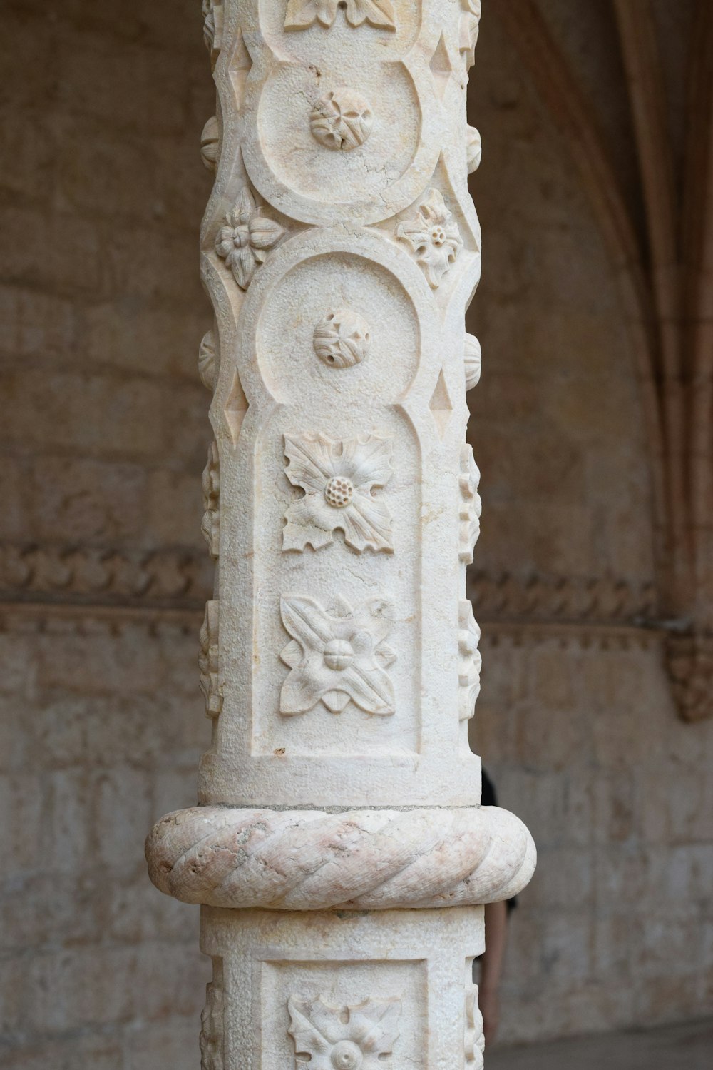 a stone pillar with carvings
