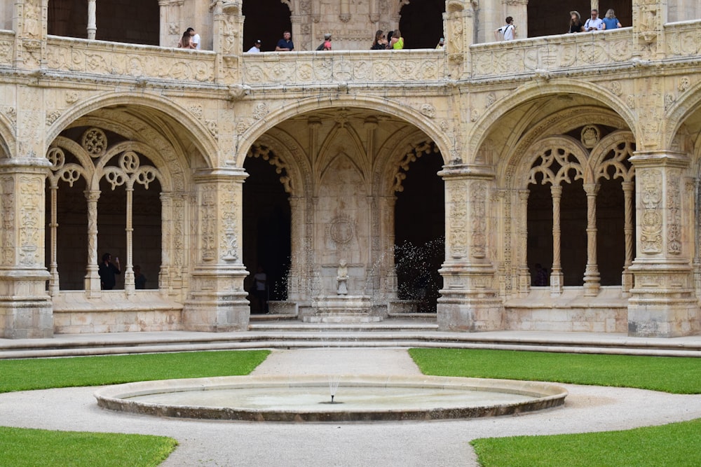 a building with a fountain in front