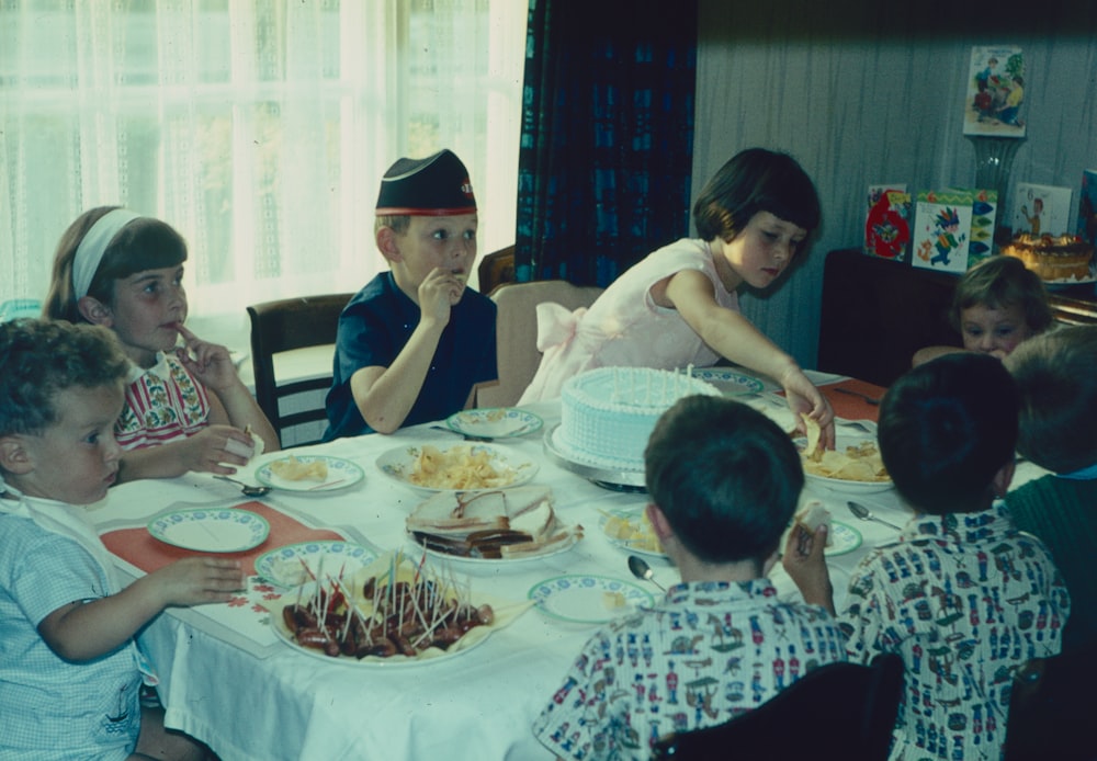 a group of people eating at a table