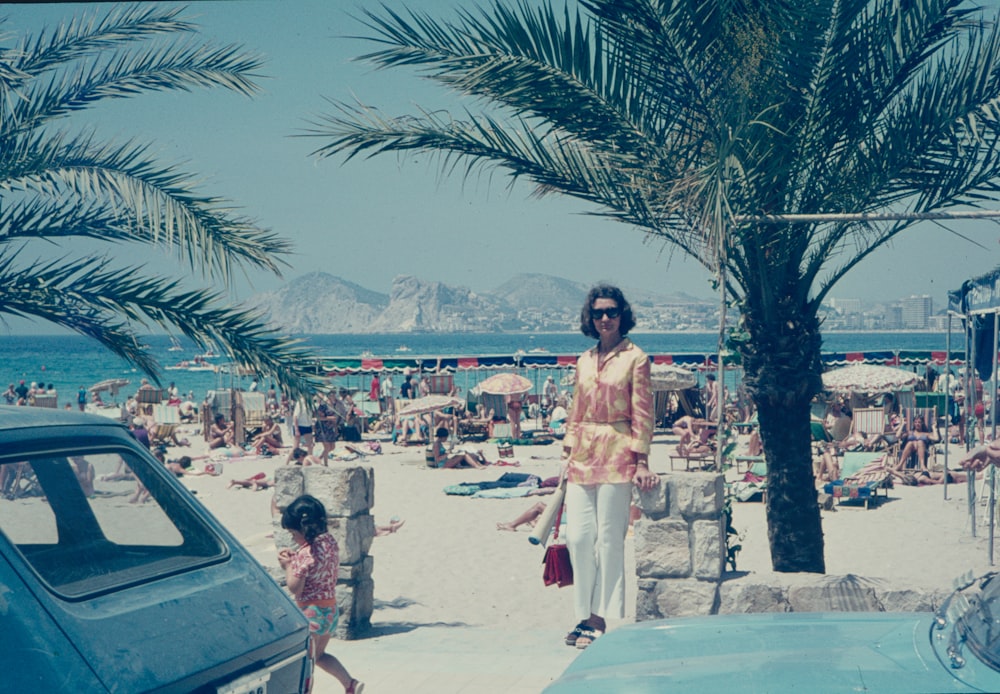 a person and a child on a beach