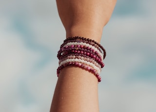 Pink, white, and red crystal bracelets