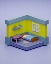 A minimalist 3D-rendered room with light blue and yellow walls, featuring a single bed with a blue blanket and brown headboard. A small purple table is positioned beside the bed, and a floating shelf above holds two potted plants. A simple artwork or decoration is displayed on the wall.