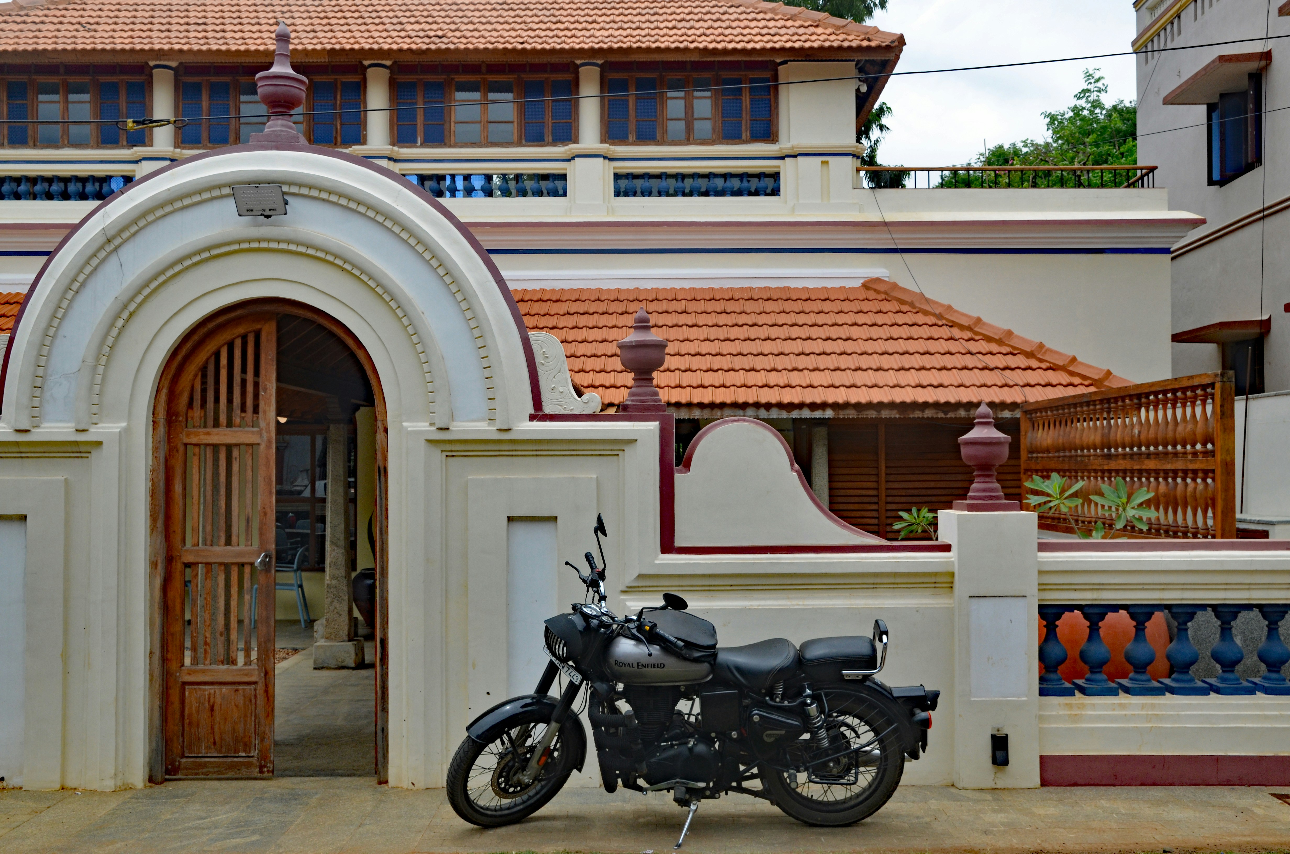 a motorcycle parked in front of a building