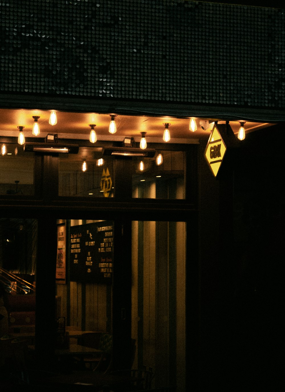 a building with lights on the ceiling