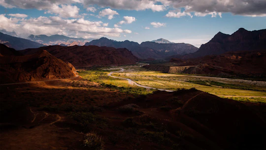 a winding road through a valley