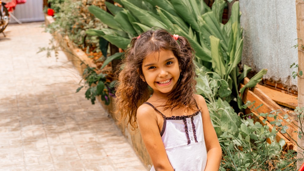 a girl smiling for the camera