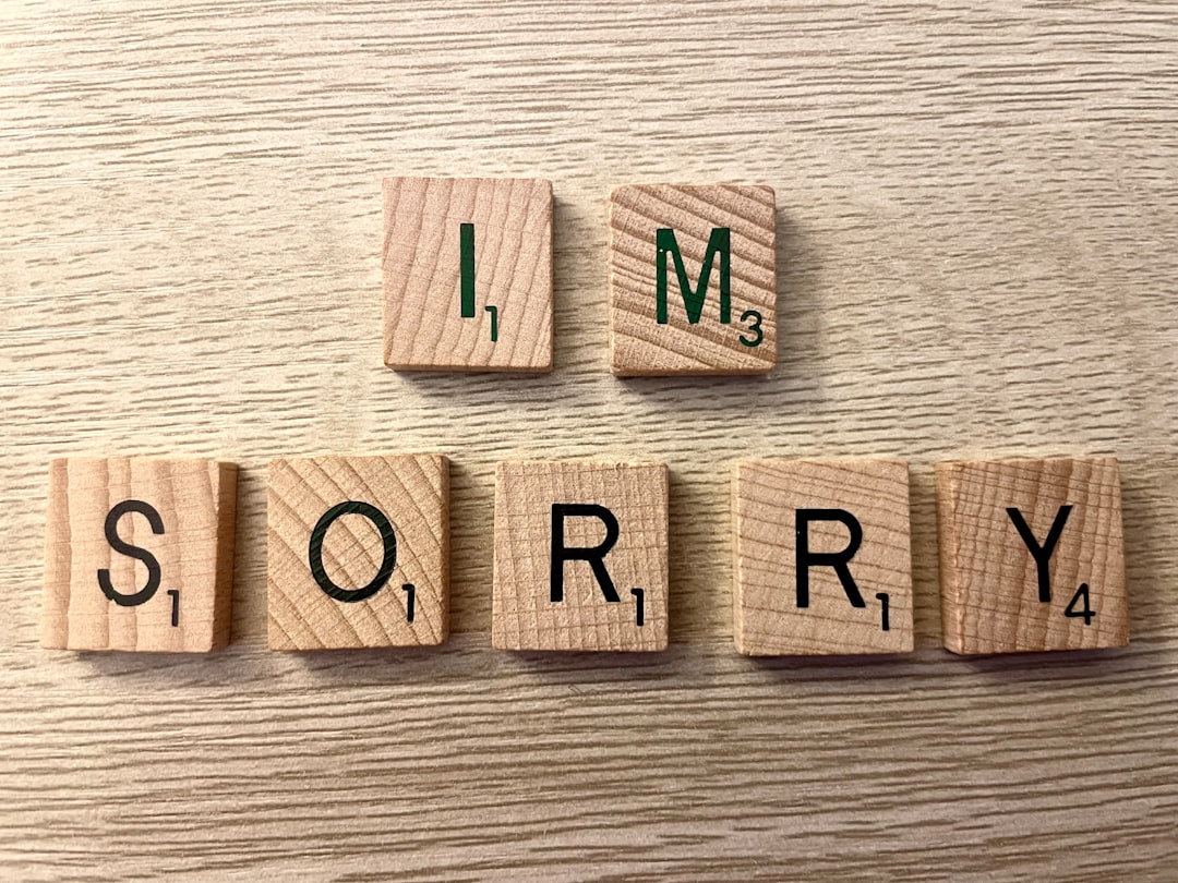 A Confession and Heartfelt Apology_a group of wooden letters