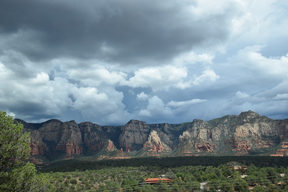 a landscape with mountains and trees