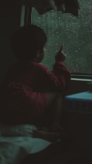 a child sitting in a chair